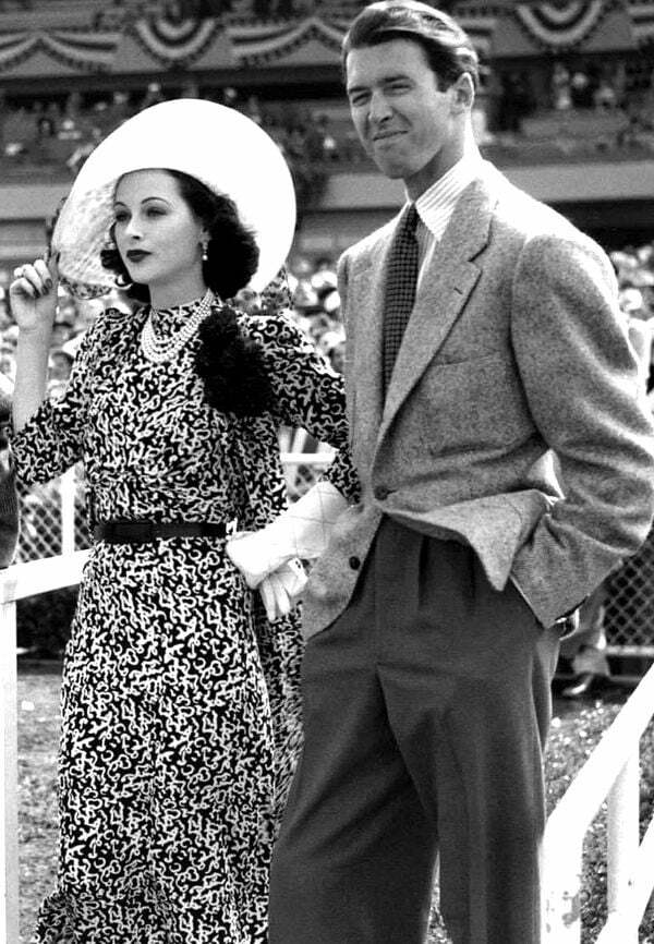 Hedy Lamarr and Jimmy Stewart attend Hollywood Park during Red Cross Day; July, 1940.