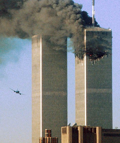 File photo of hijacked United Airlines Flight 175 flying toward the World Trade Center twin towers shortly before slamming into the south tower in New York
