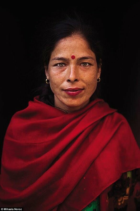 KATHMANDU, NEPAL This woman didn’t speak English, so I told her son I wanted to photograph her because she’s beautiful. He smiled proudly Yes, she is