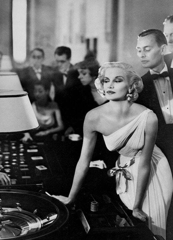 Evening gown by Madame Grès at the tables in the Casino at Le Touquet, photo by Richard Avedon, 1954